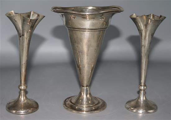 A pair of late Victorian silver specimen vases and one other sterling silver vase, largest 6.75in.